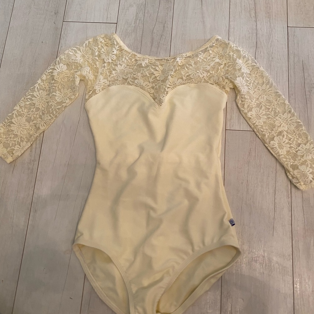 Elegant Cream Lace Bodysuit